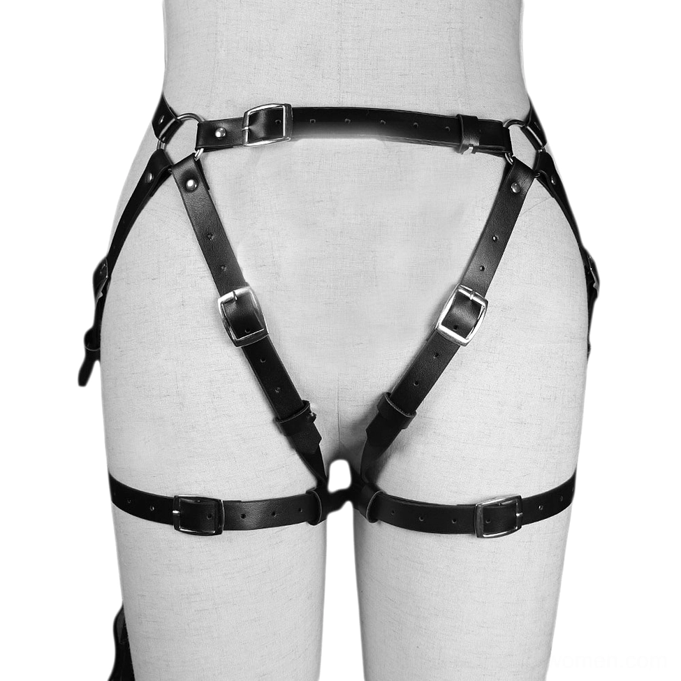 Adjustable leather bondage harness on white mannequin torso showing left rear angle with metal fasteners, cross strap construction, and synthetic leather material details