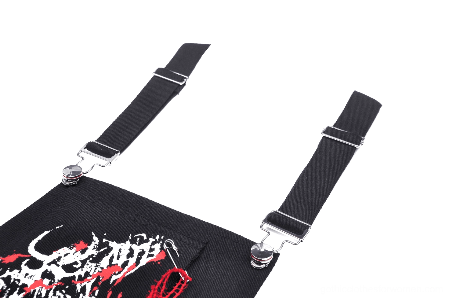Close-up detail of adjustable webbing strap with metal buckle hardware on skeleton pleated dress