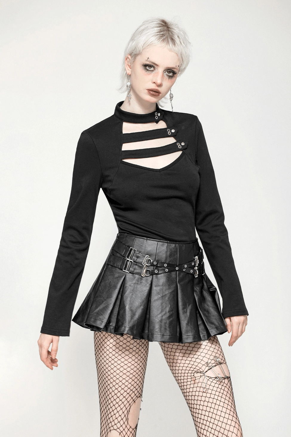 Alternative fashion black gothic long sleeve top with strategic chest cutout and button detail styling
