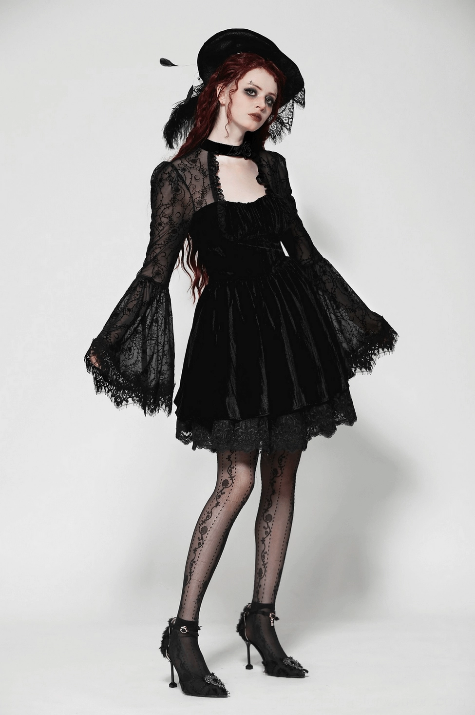 Alternative fashion gothic dress with velvet accents and ornate lace layering