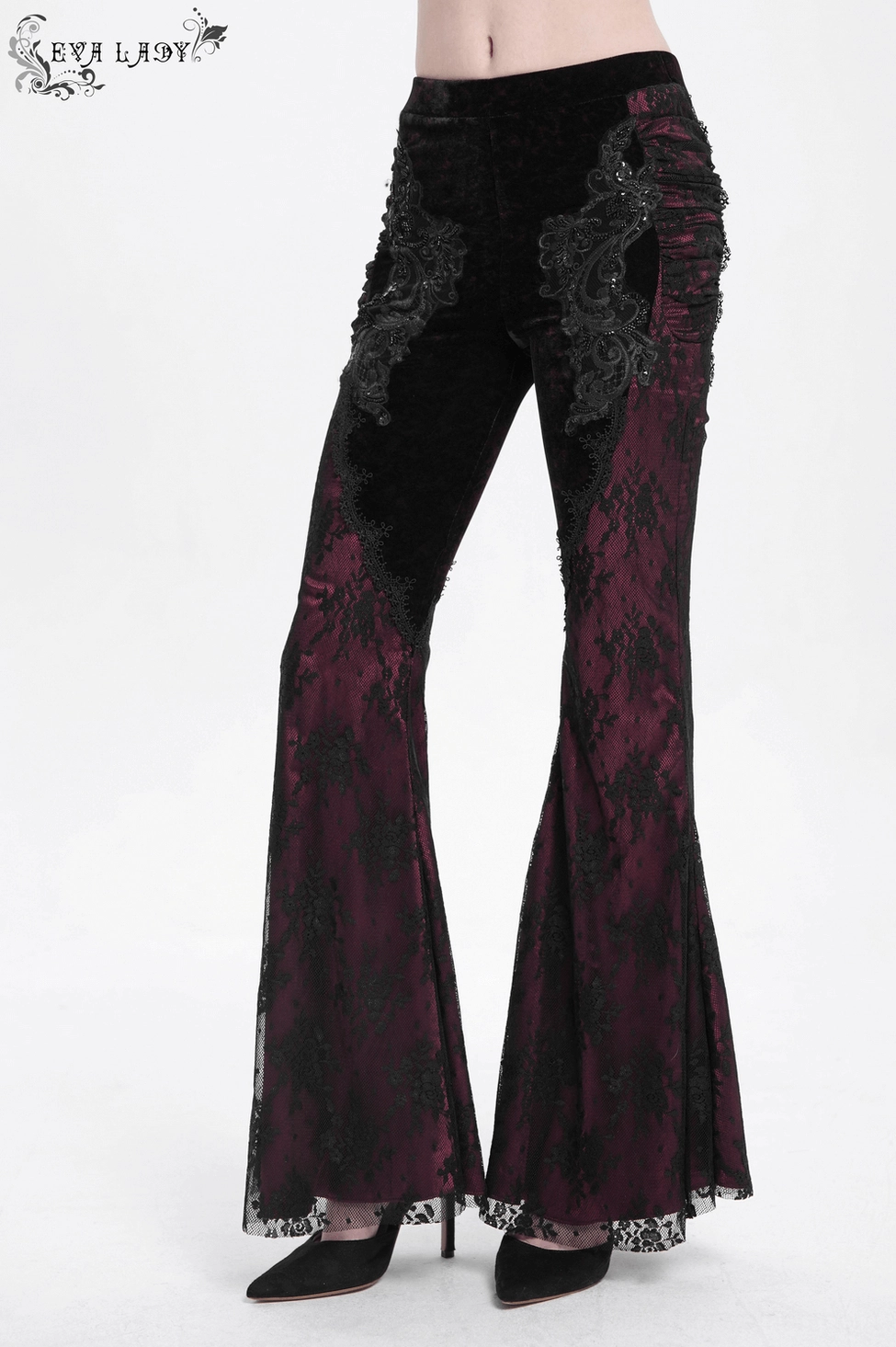 Alternative fashion black-burgundy flare pants highlighting sheer lace overlay detailing and embroidered hip appliqué work