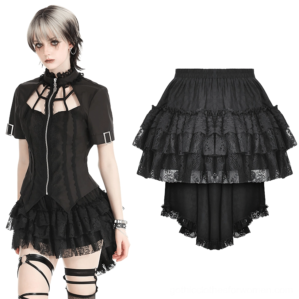 Alternative fashion black tiered ruffle skirt - full front view on model with cutout corset and leg harness