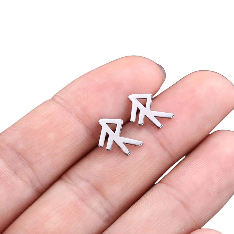 Arrow-shaped gothic rune stud earring close-up, angular silver stainless steel design with precise craftsmanship