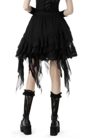 Rear view of asymmetric gothic ruffle skirt displaying sheer trailing tulle and layered ruffles