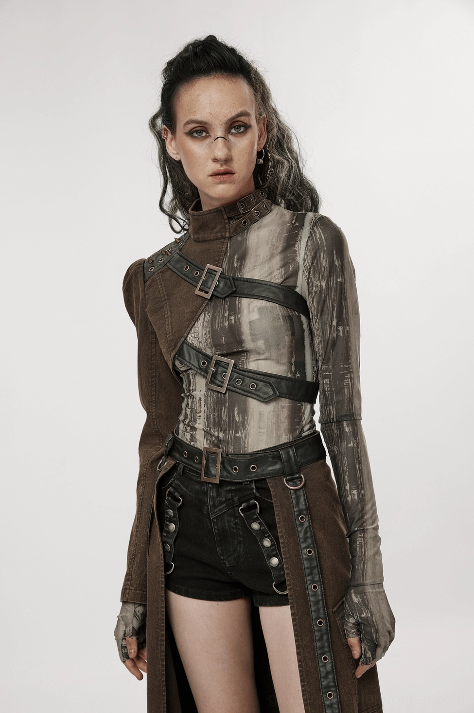 Asymmetrical gothic jacket front presentation on display showcasing the bold asymmetrical silhouette and buckle strap design