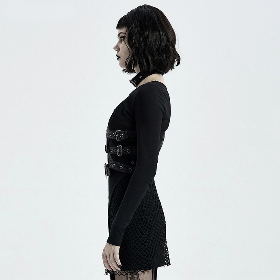 Full-length view of asymmetrical leather shoulder harness with python buckle worn by model showing gothic fashion styling
