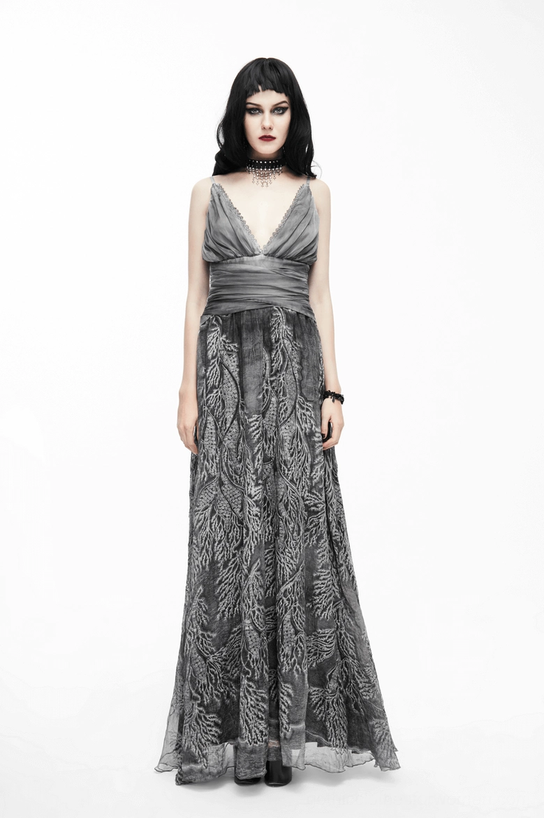 Backless gothic dress detail showing spaghetti strap adjustment and upper back design