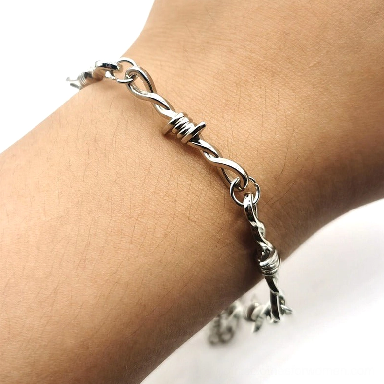 Edgy barbed wire metal link bracelet alternative unisex jewelry closeup