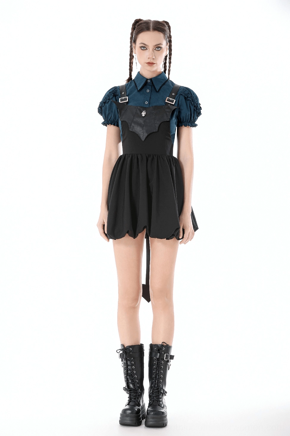 Black bat corset dress with heart-shaped skirt tail shown on model from front angle