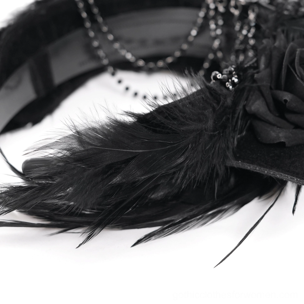 Black bat crown headpiece architectural detail emphasizing wing structure and intricate embellishments