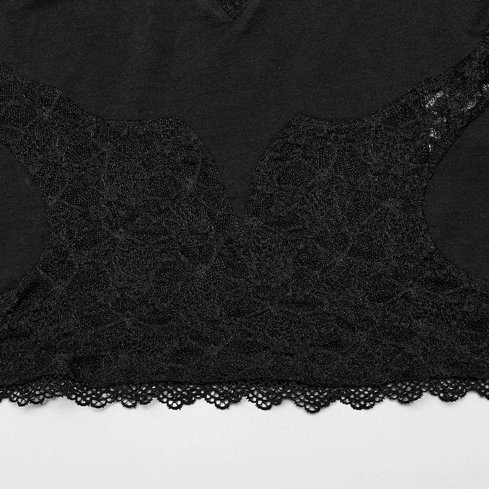 Close-up detail of bat-shaped lace overlay panel with scalloped bottom trim on crop top
