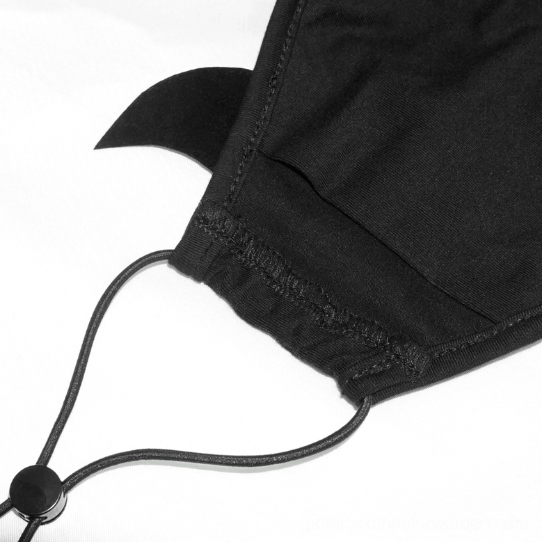 Side angled view of demon mask highlighting flocked bat wing decoration and elastic ear strap