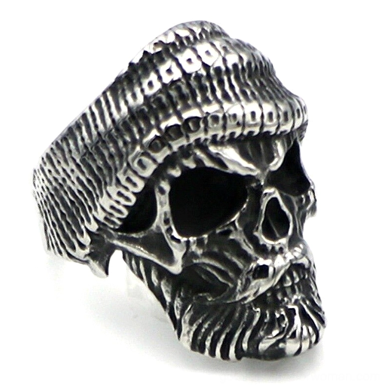 Left side close-up of bearded skull gothic ring highlighting knitted hat and full beard texture detail