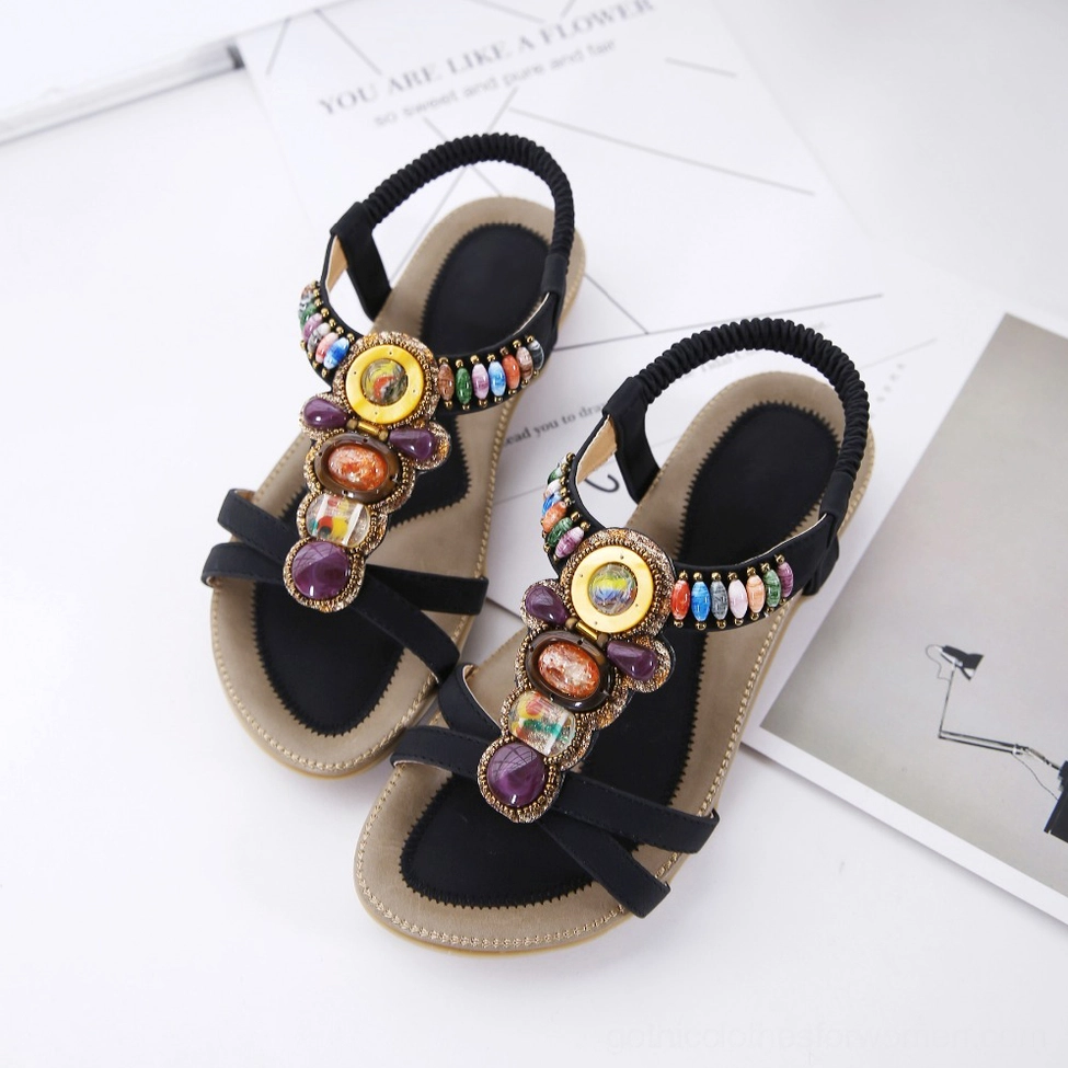 Beige beaded gothic sandal interior construction showing synthetic lining and bonded leather insole