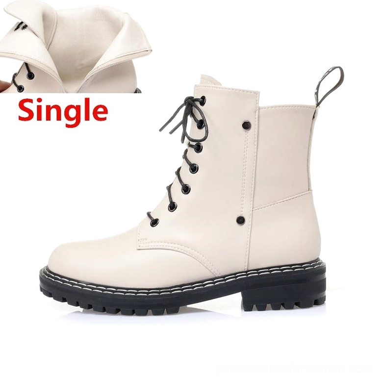 Beige gothic leather ankle boot side profile showing heel height and thin microfiber lining