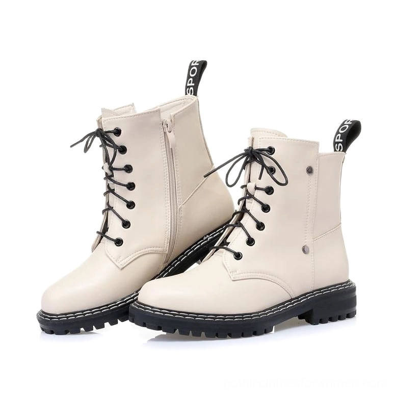 Beige leather combat boot three-quarter view with side zipper closure and stitched rubber sole