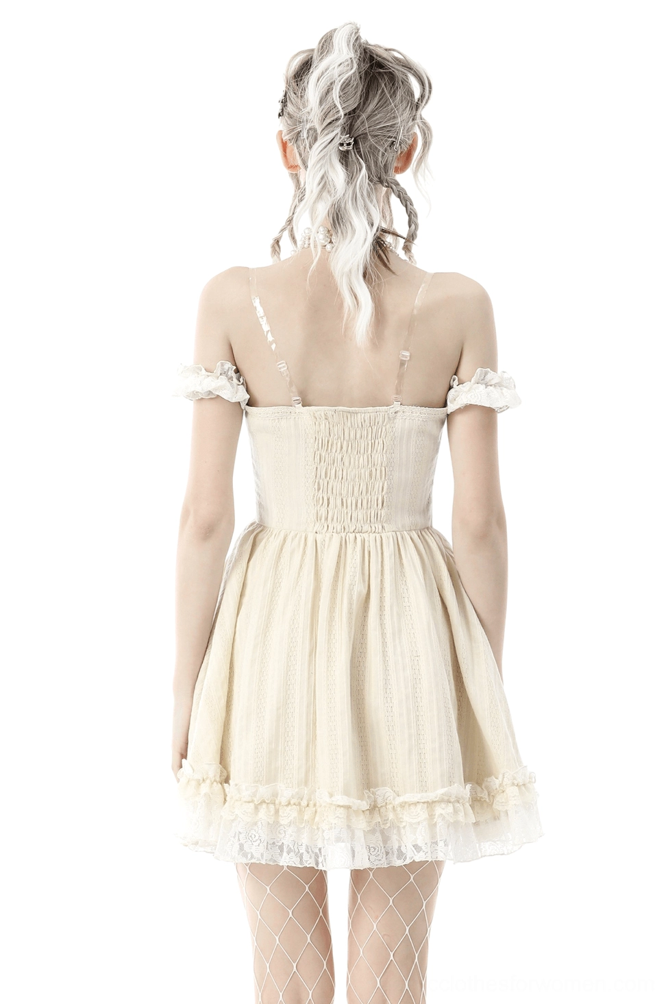 Beige gothic off-shoulder lace dress - back view showcasing shirred bodice and ruffled lace hem with fishnet stockings styling