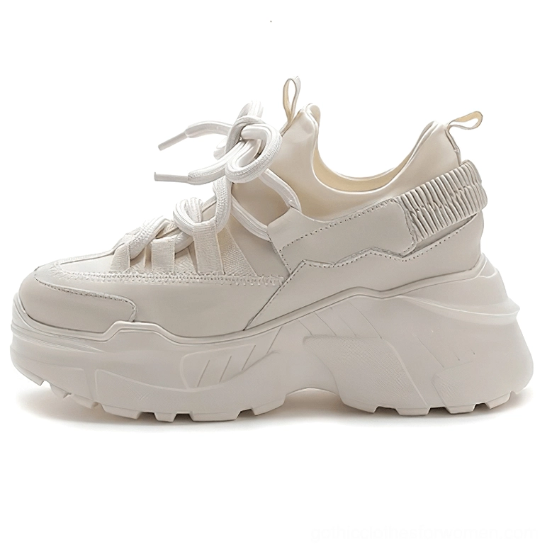 Single beige platform sneaker highlighting ribbed heel panel and commanding thick lug outsole structure
