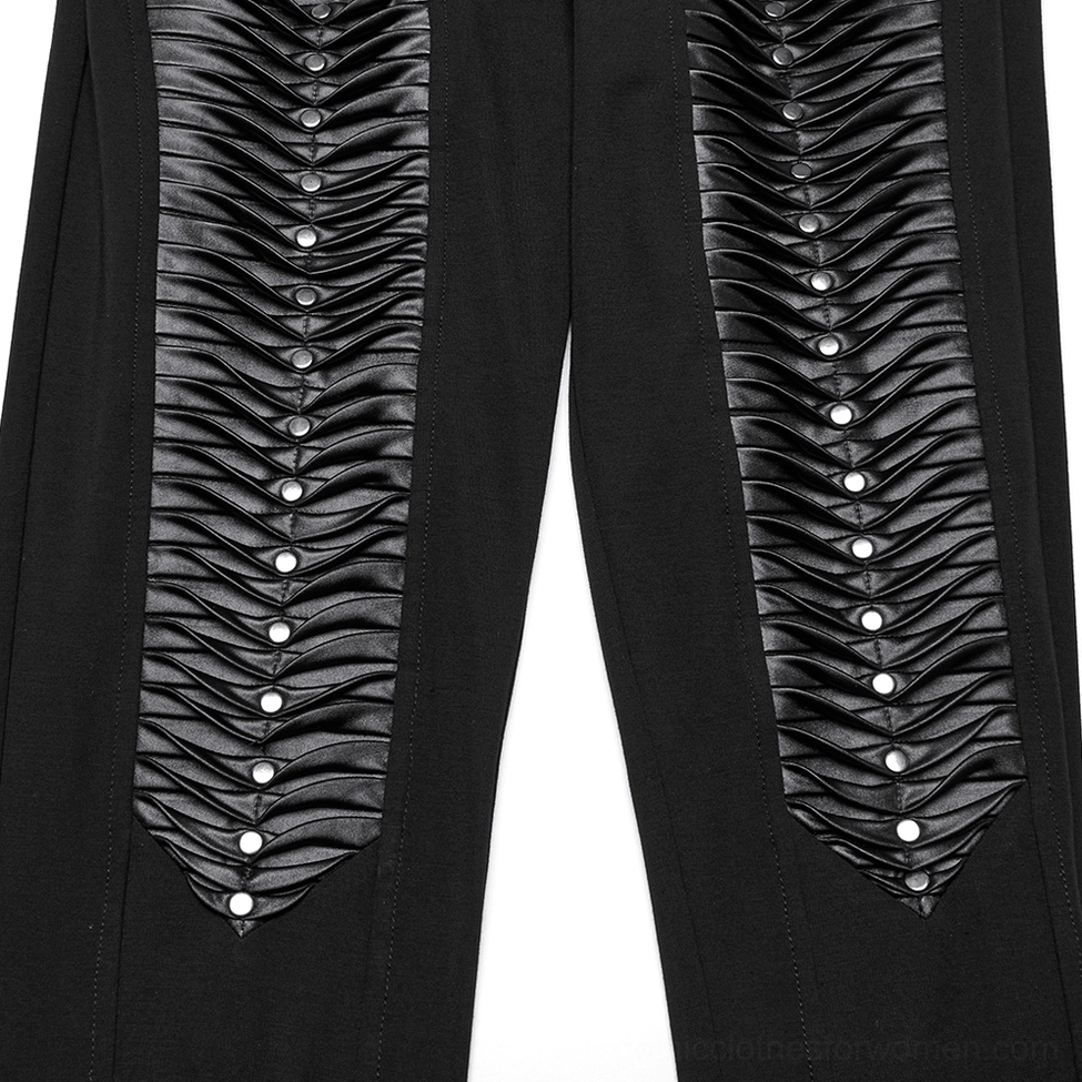 Close-up of 3D faux leather pleats and metal stud accents on front of gothic leggings