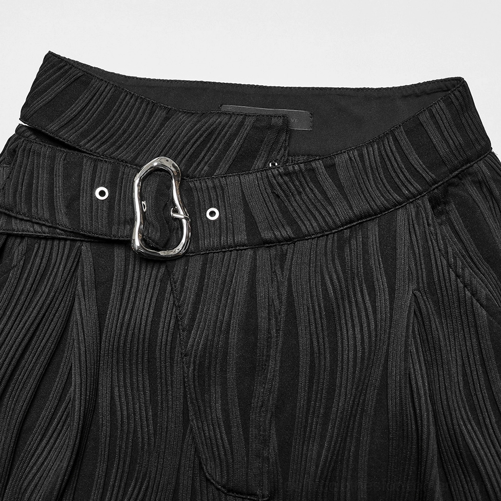 Black gothic pants waistband close-up - silver metal asymmetrical buckle and stitched waistband detail on dark knit fabric