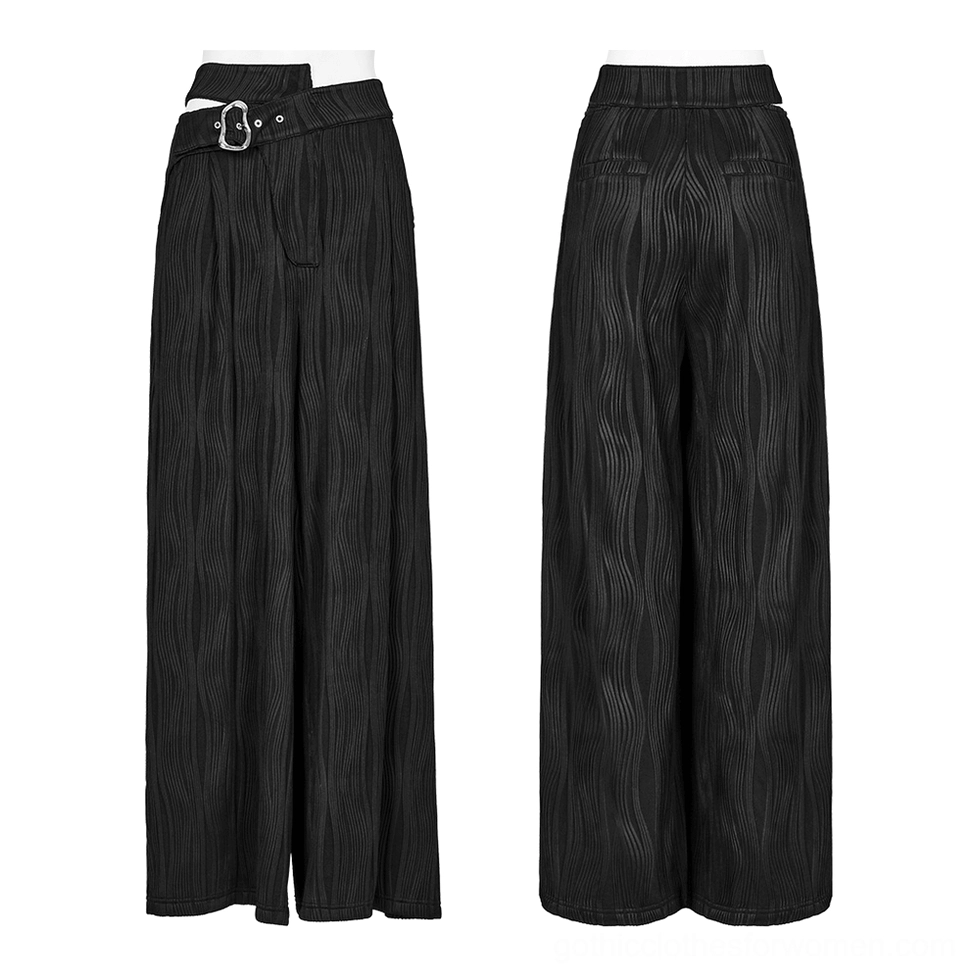 Black asymmetrical gothic pants front and back comparison - silver buckle detail and wavy stripe texture visible on both sides of wide leg silhouette