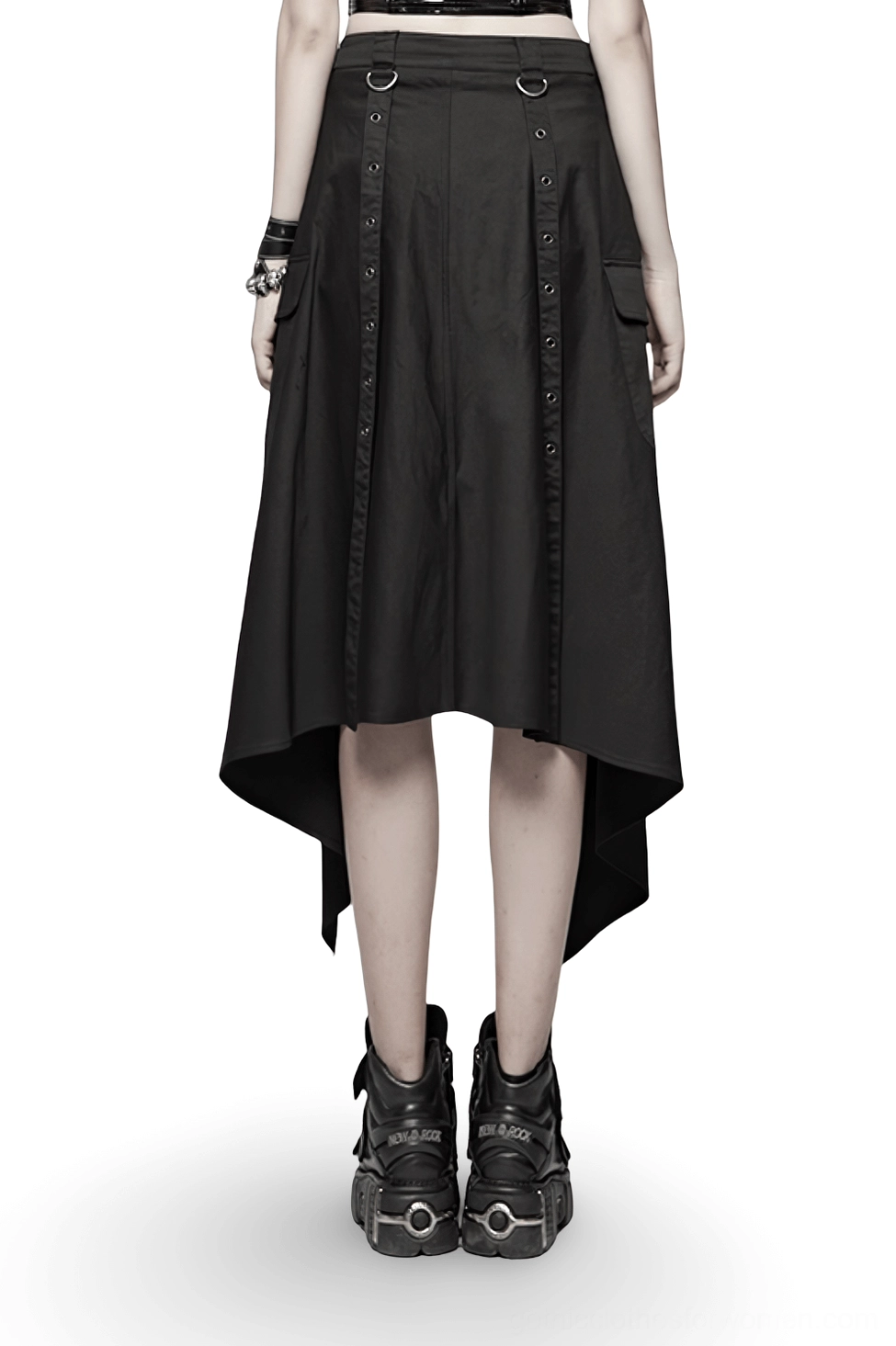 Back view of black asymmetrical cargo mini skirt on model displaying high-low hem design with side cargo pockets and gothic edge