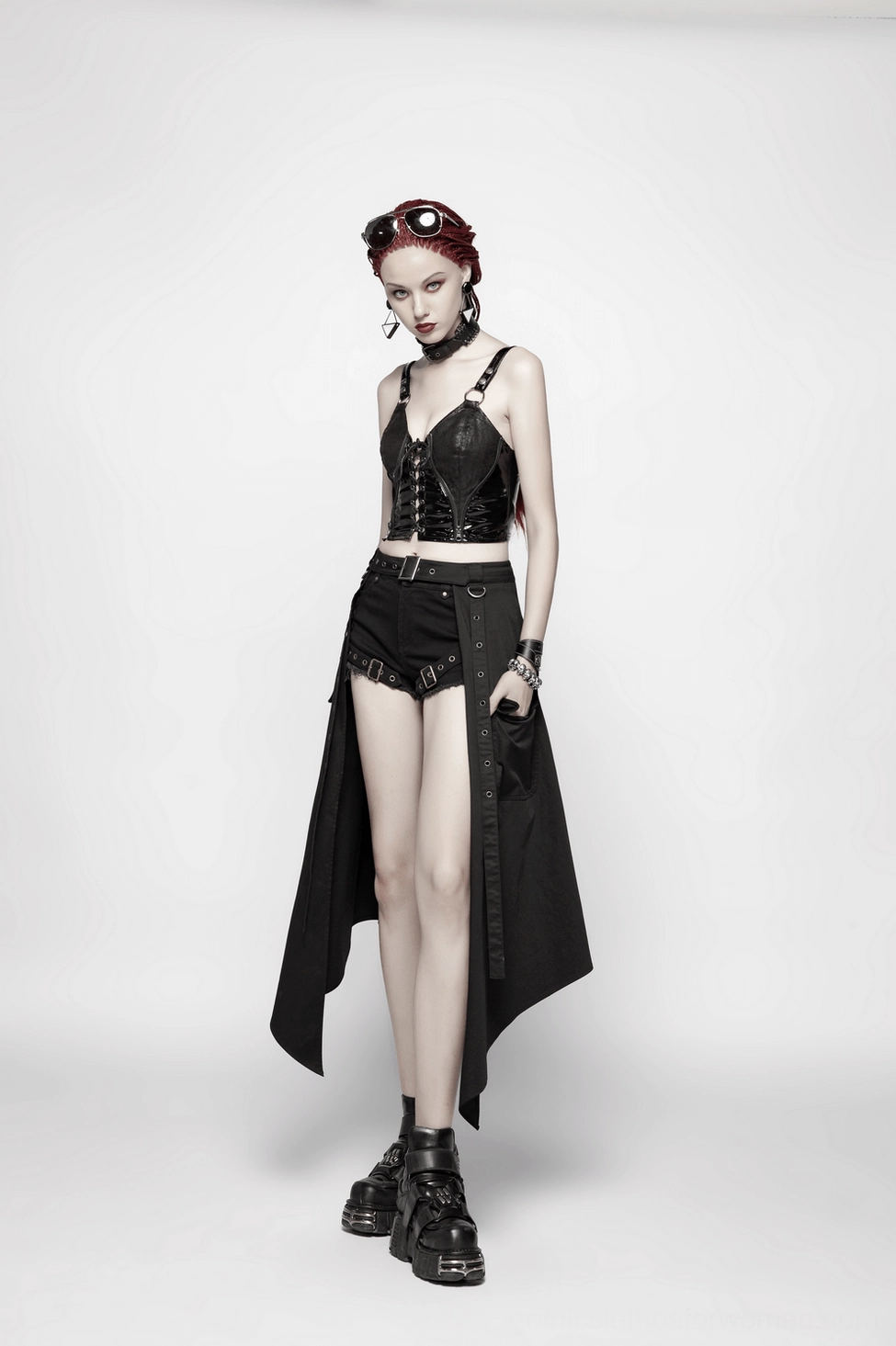 Black asymmetrical cargo skirt full product view highlighting alternative fashion design and structured woven construction
