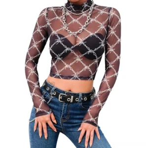 Black barbed wire mesh crop top front view on model with chain necklaces, gothic street styling