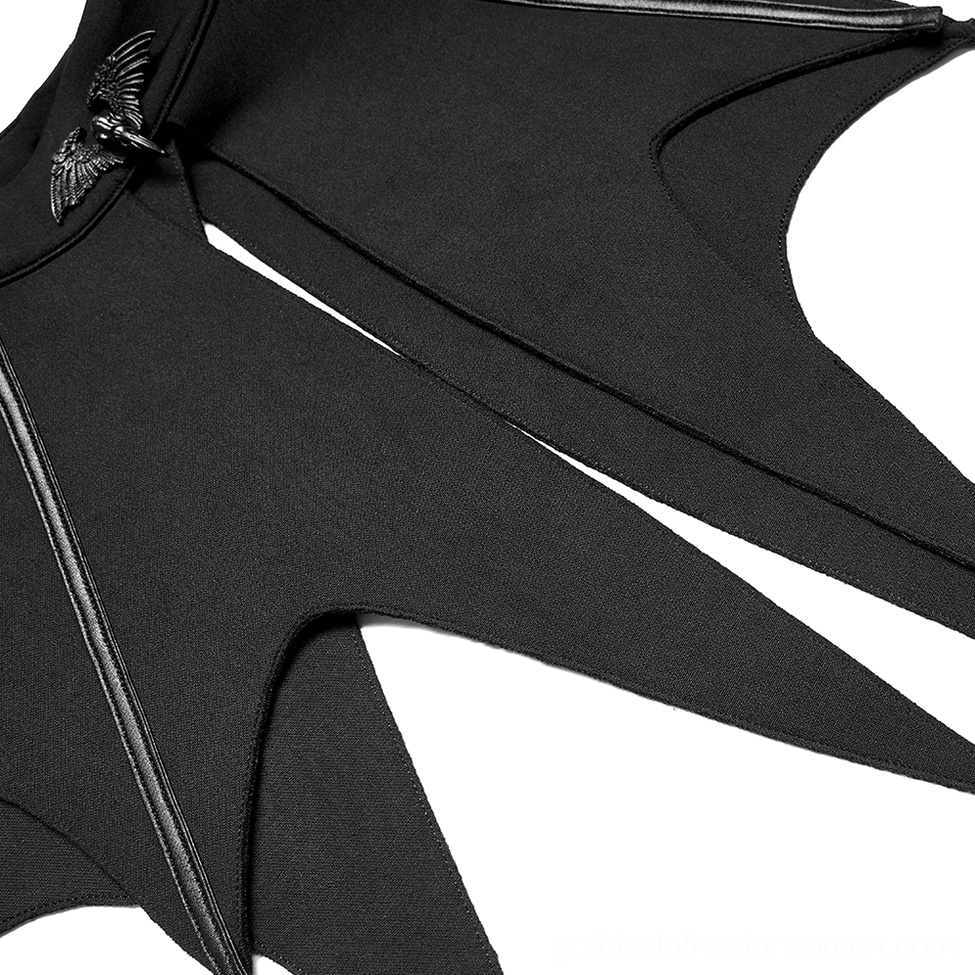 Close-up detail of black bat cape fabric texture and piped trim edges