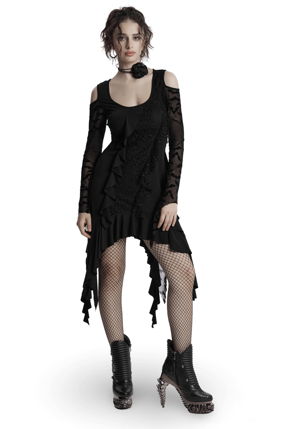 Front three-quarter view of black bat mesh cold-shoulder gothic dress with asymmetrical ruffled hem, sheer mesh sleeves featuring bat print, worn with fishnet stockings on model