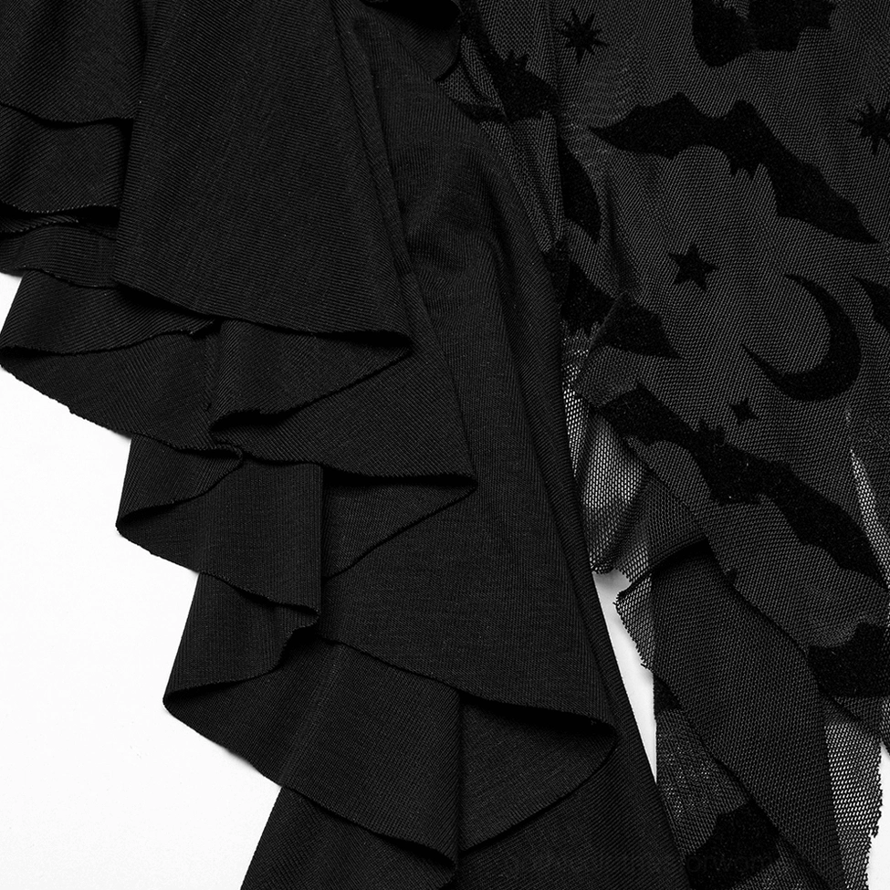 Close-up detail shot of black gothic dress hem and sleeve showing layered ruffled trim, gothic-printed mesh fabric, and irregular hemline