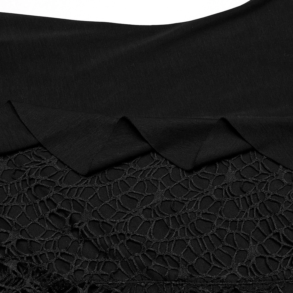 Close-up of layered ruffle edge and intricate spiderweb lace trim on black gothic bat mesh dress