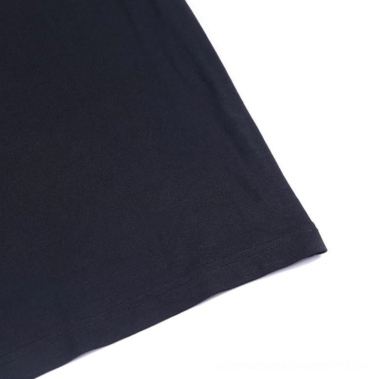 Flat lay detail of matte black stretch cotton fabric showing neat seam construction and premium fabric quality