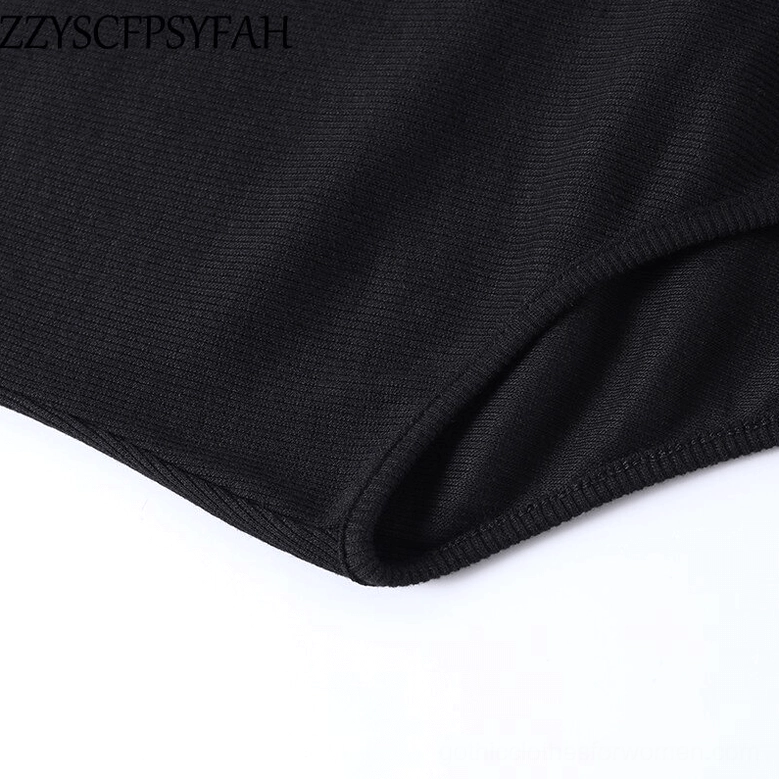 Black bodysuit side seam showing tailored construction and finish detail