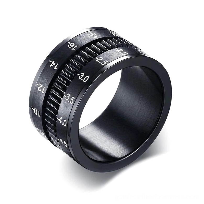 Black camera lens spinner ring stainless steel with engraved aperture markings, 45-degree side view gothic jewelry