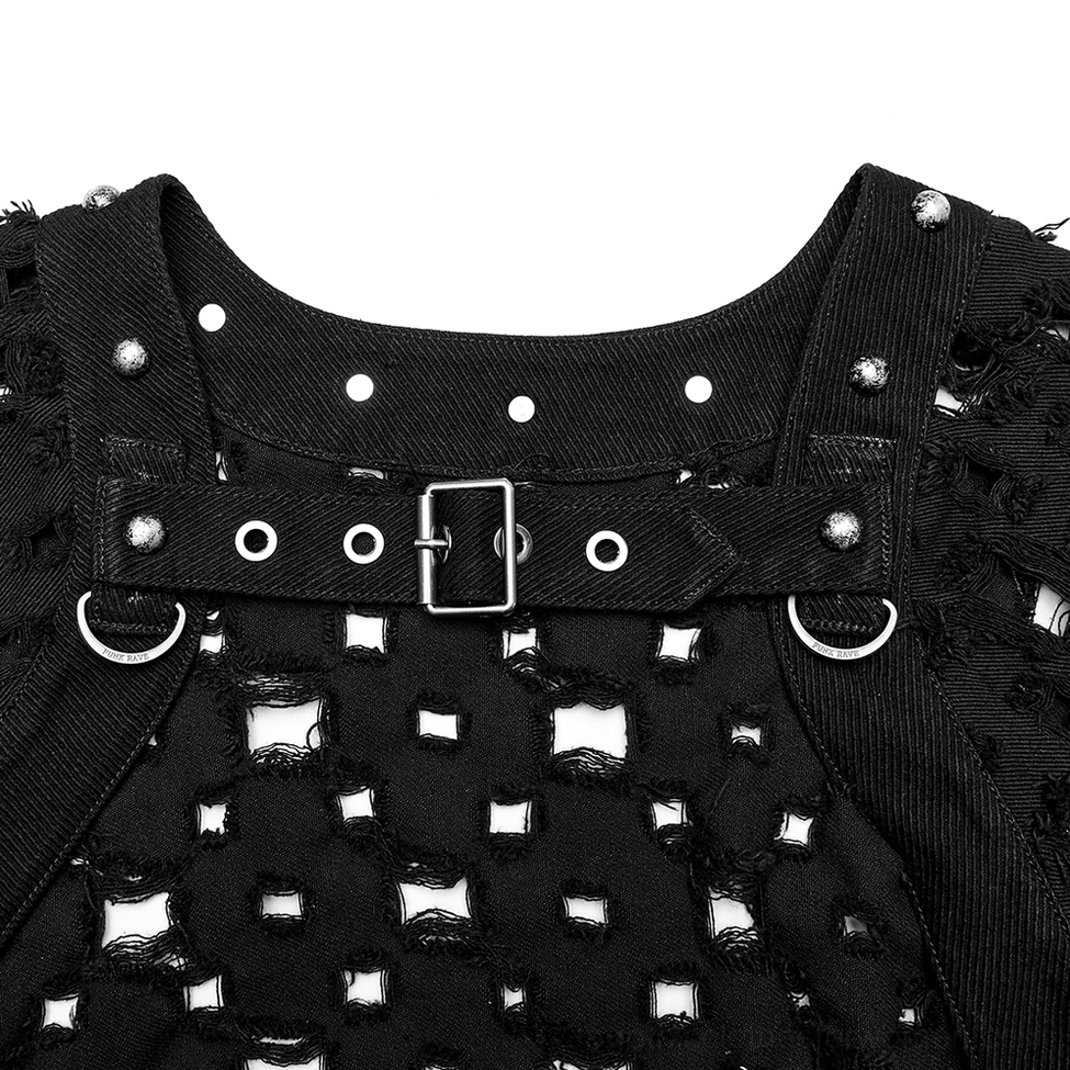 Collar and shoulder detail of black cape cardigan showing metal skull rivets, buckle strap, and metal eyelets