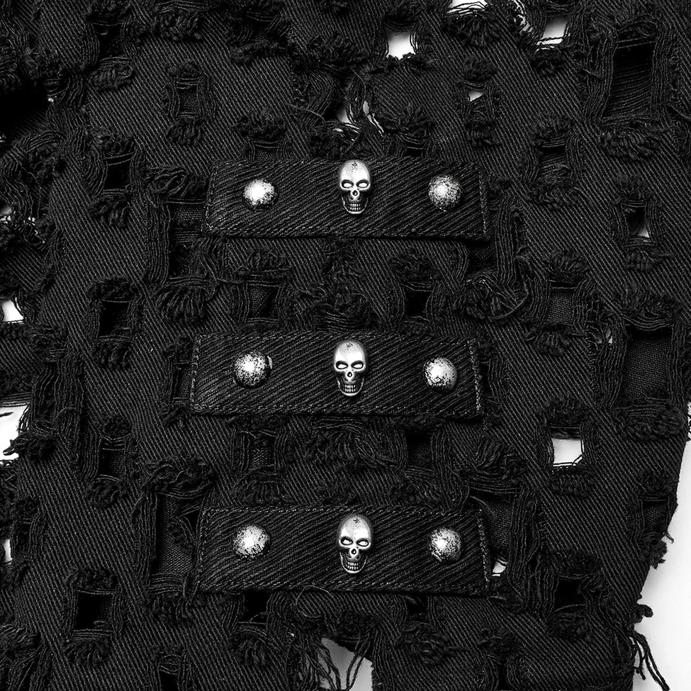 Black gothic cape cardigan fabric detail showing distressed texture, cutout pattern, and hand-crafted fraying