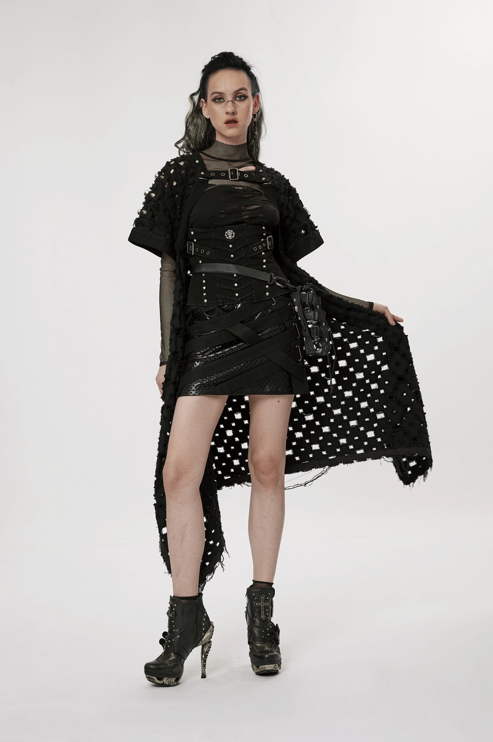 Black cape cardigan with neck harness buckle and all-over square cutouts, theatrical gothic fashion piece