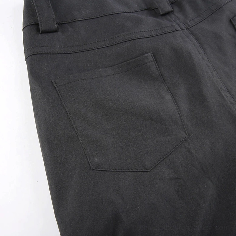 Women's black cargo pants with decorative chains, showcasing the fusion of punk and gothic style aesthetic