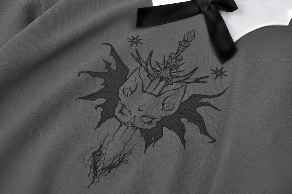 Close-up detail of black cat graphic print on dark gray gothic sweatshirt fabric