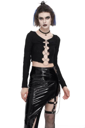 Black chain lace-up gothic crop top front view on model, featuring pentagram chain details and strategic cut-outs with long fitted sleeves