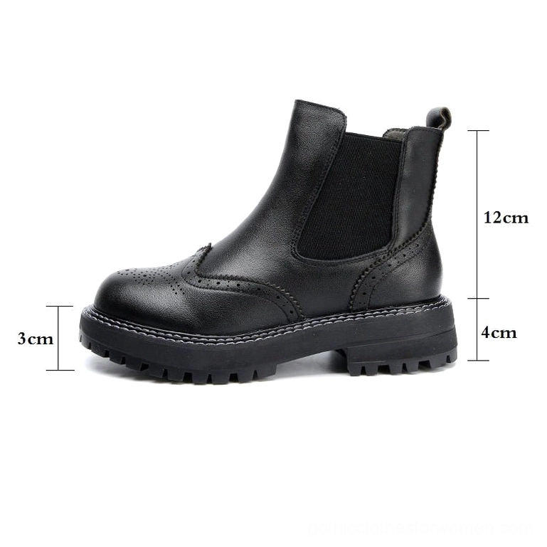 Black leather brogue Chelsea boots with elastic side gore and size reference markers