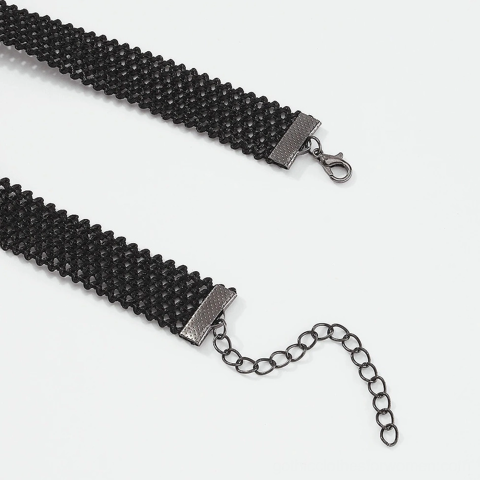 Top view of black choker strap showing metal lobster clasp and adjustable extension chain, highlighting hardware and fastener details