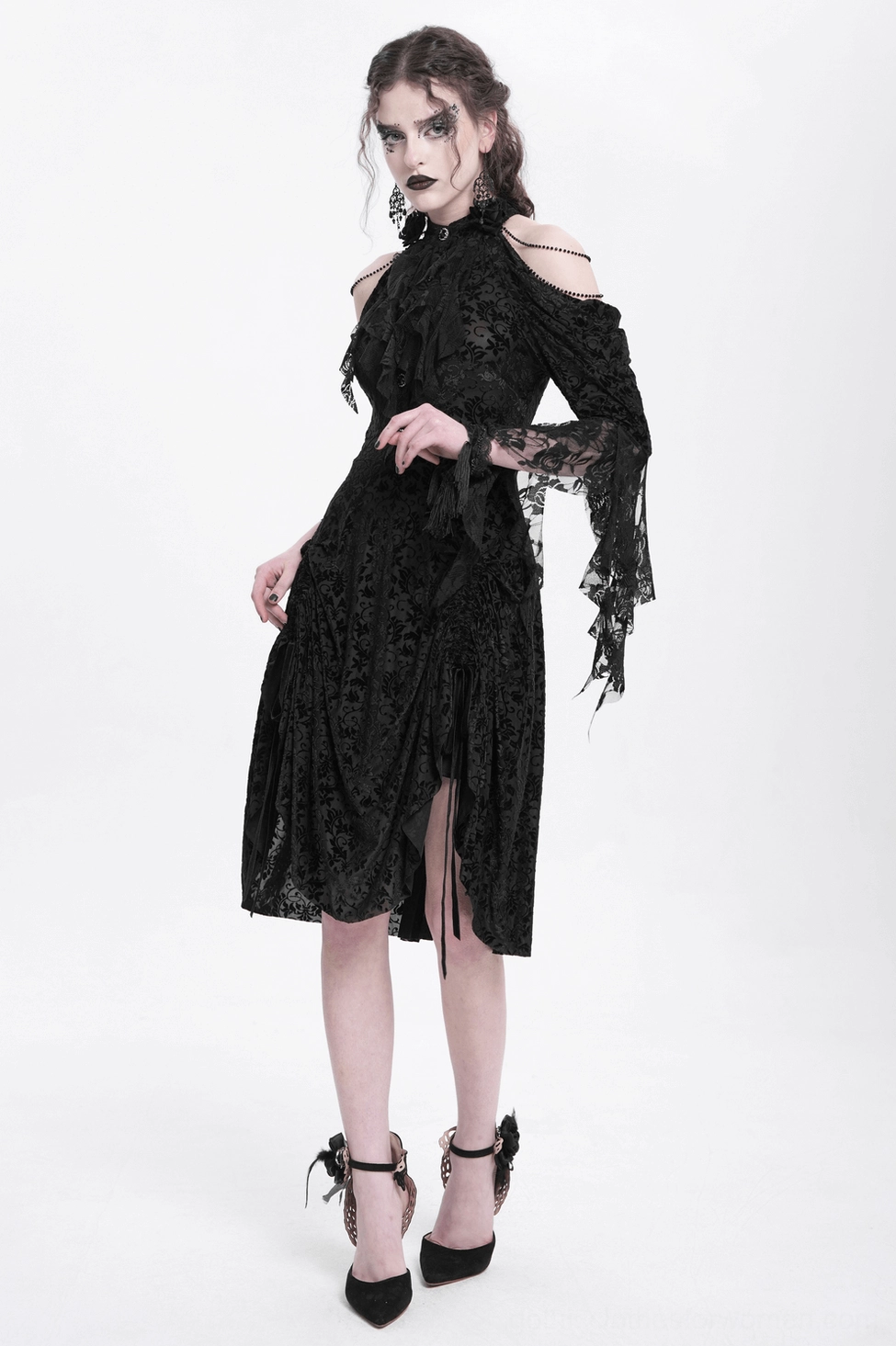Black cold-shoulder gothic lace dress with flared sleeves and fitted waist silhouette, model wear