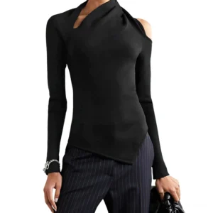Black asymmetric cold shoulder gothic long sleeve top front view on model, showing irregular hemline and fitted silhouette