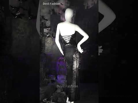 Mannequin dressed in black rivet corset with matching gothic skirt display