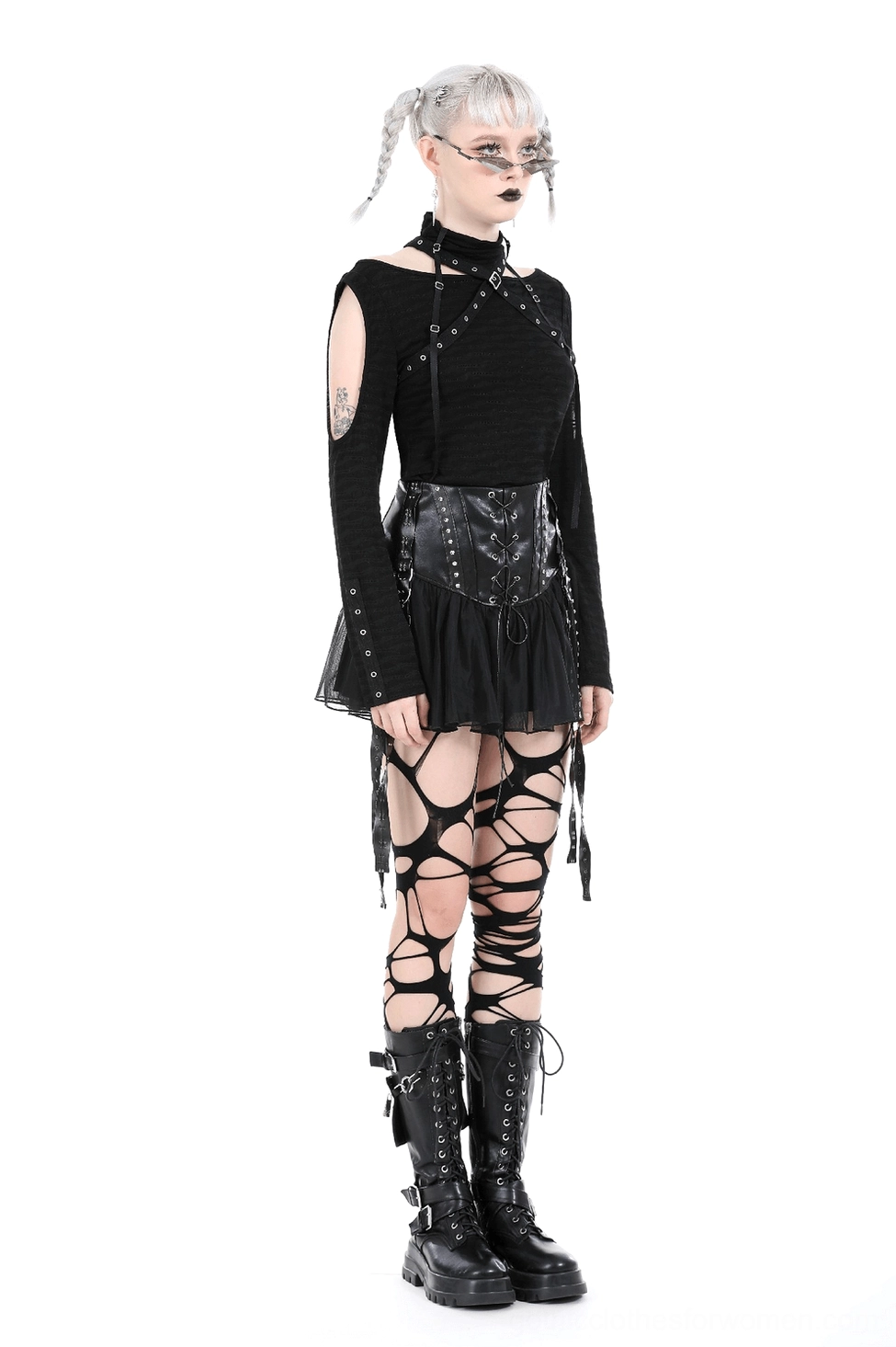 Three-quarter view of black corset tulle mini skirt highlighting lace-up closure and tulle construction
