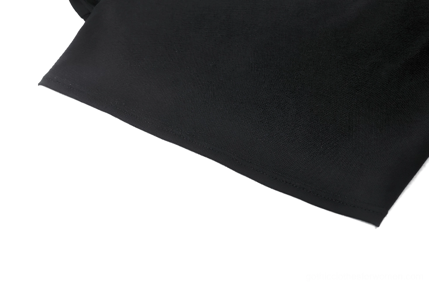 Macro shot of stretchy matte black cotton fabric with premium texture