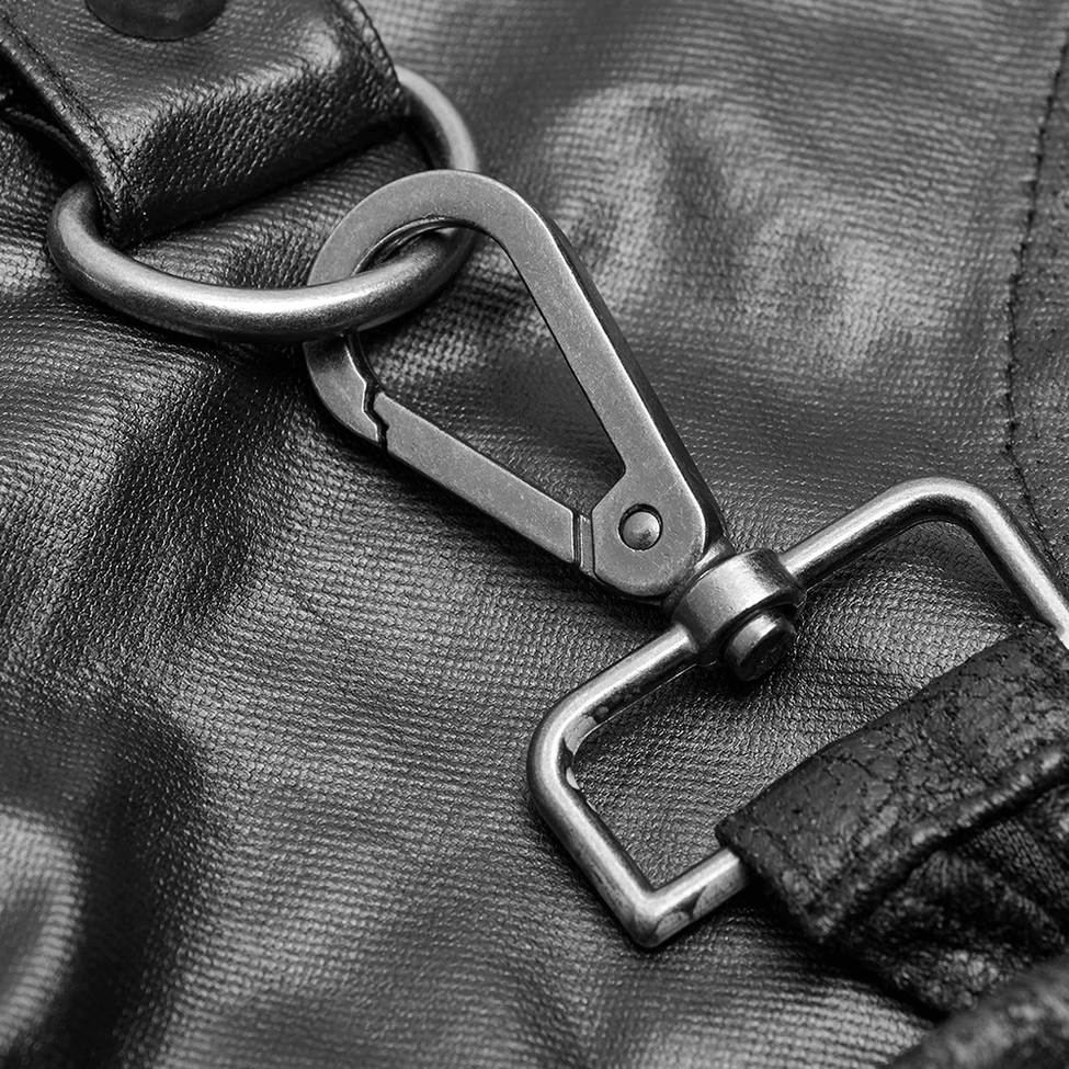 Black cracked faux leather dieselpunk half kilt - styling detail showing texture and material composition