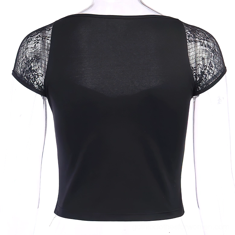Back view of black gothic crop top on mannequin showing solid fabric and sheer lace cap sleeves